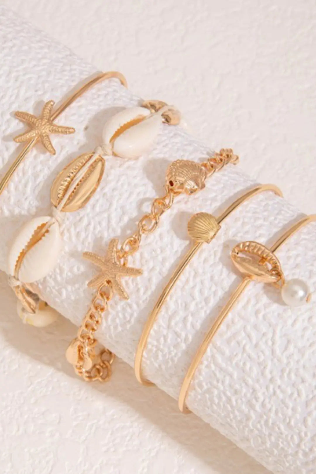 ARMBAND MIT MUSCHELN UND SEESTERNEN JUWELORA