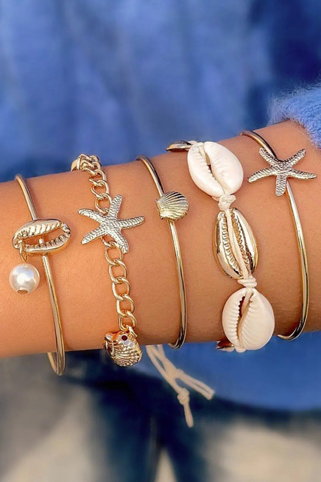 ARMBAND MIT MUSCHELN UND SEESTERNEN JUWELORA
